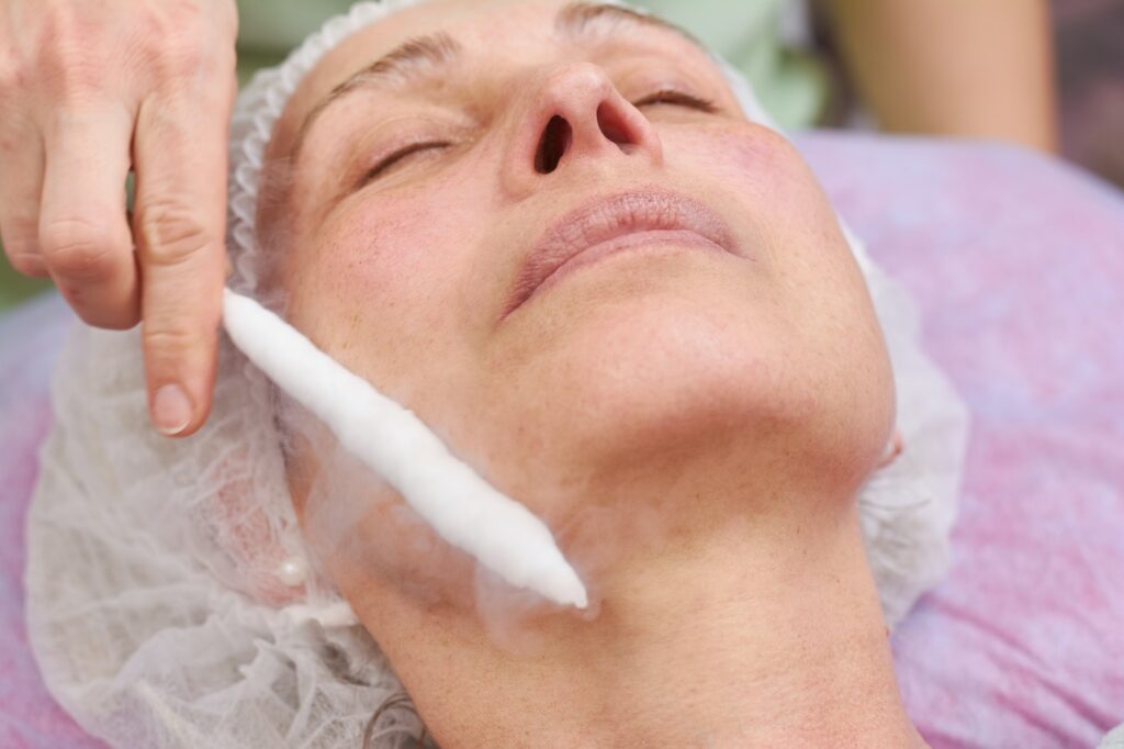 Face cryomassage close up