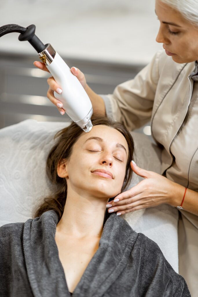 Woman during a laser rejuvenation treatment